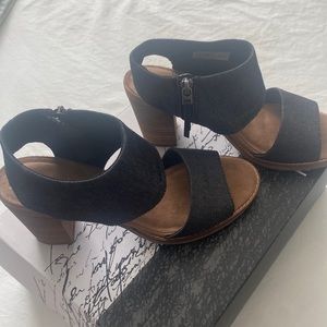 TOMS sandals. Excellent shape as you can see. Hardly worn.